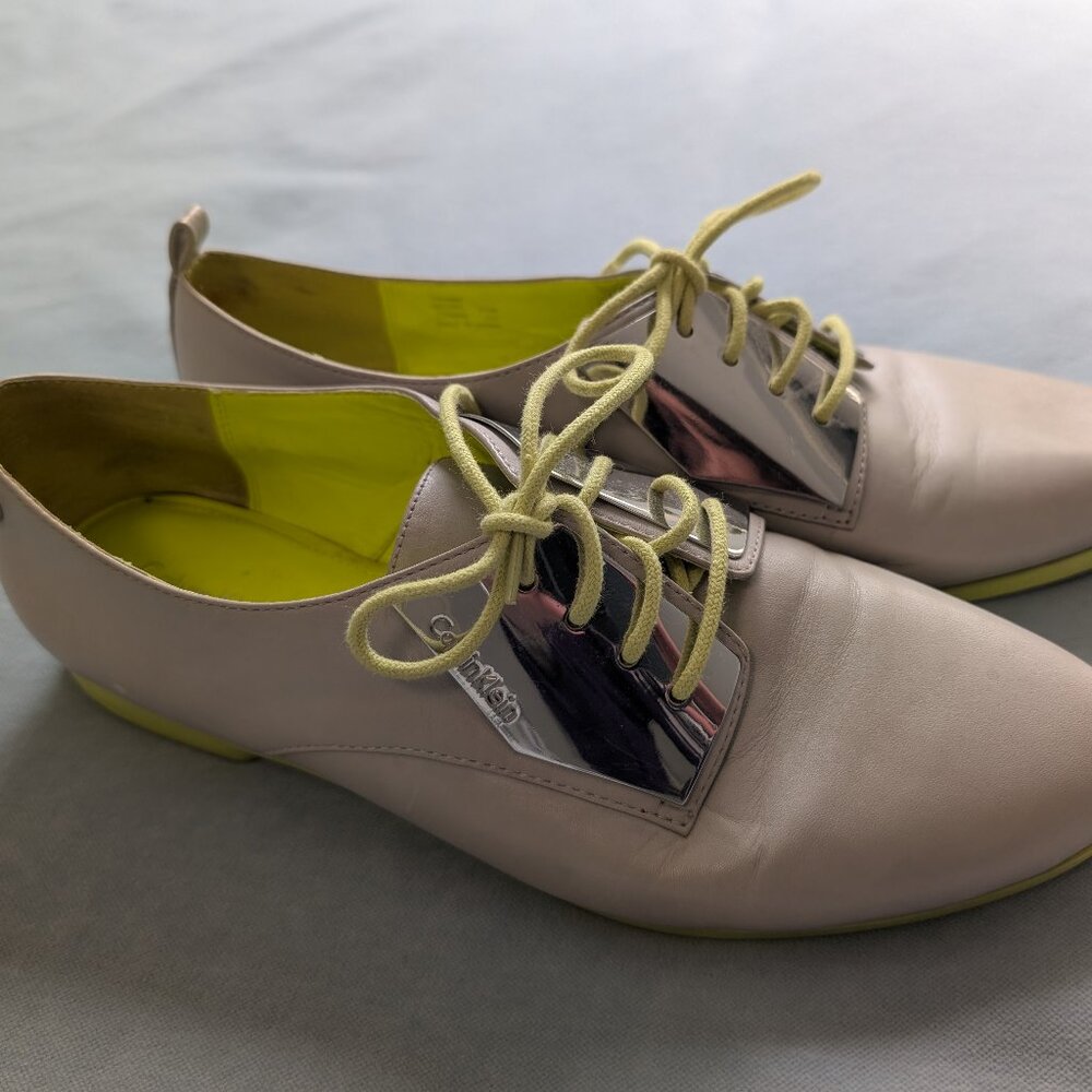Calvin Klein grey and neon oxfords with metal quarters